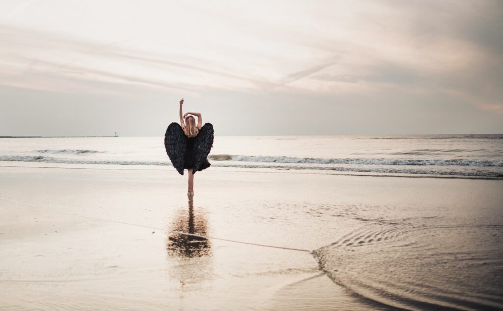Photo by <a href="https://unsplash.com/@sjois71?utm_content=creditCopyText&utm_medium=referral&utm_source=unsplash">joyce huis</a> on <a href="https://unsplash.com/photos/person-wearing-black-wing-costume-standing-on-seashore-during-daytime-nGyf0Xivtew?utm_content=creditCopyText&utm_medium=referral&utm_source=unsplash">Unsplash</a>